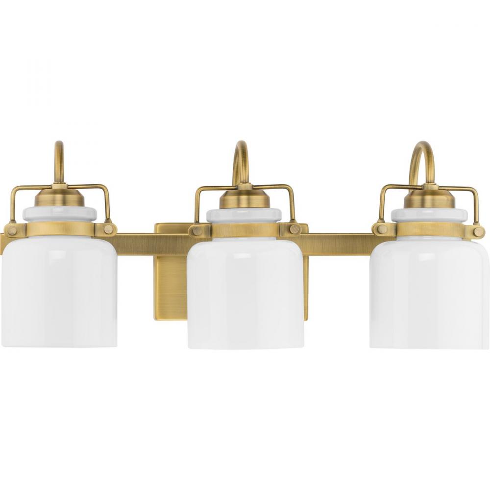 Fessler Collection Three-Light Vintage Brass Opal Glass Farmhouse Bath Light